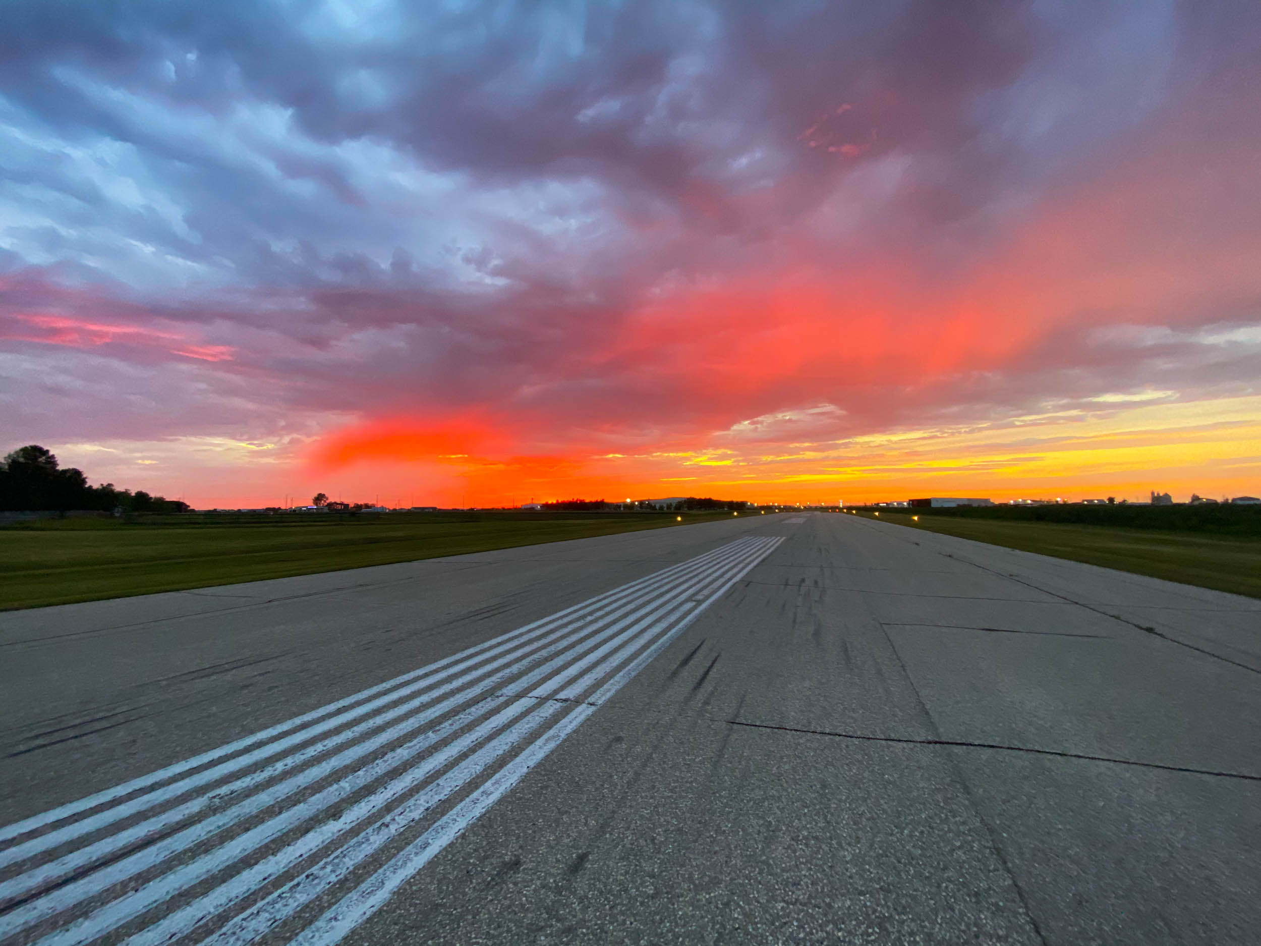 CJB3 runway at sunset